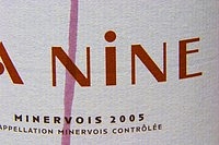 La Nine with a streak of red wine on the label