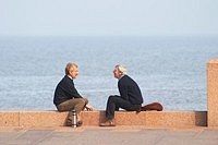 Conversation by the seaside