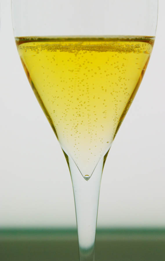 A glass of champagne with bubbles