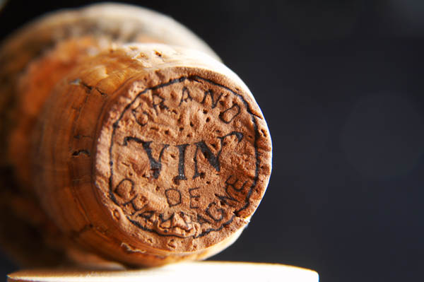 An old champagne cork stamped "vin"