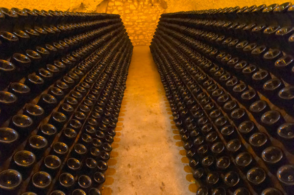Many bottles in a champagne cellar