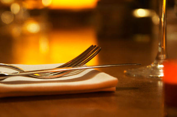 The restaurant table with knife fork, napkin