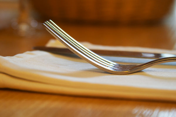 The restaurant table with knife fork, napkin