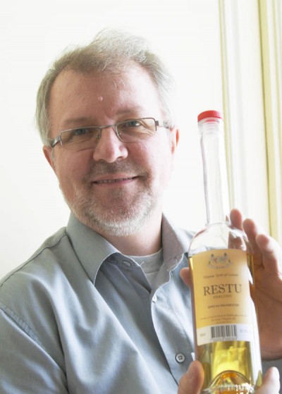 Lauri Pappinen with the prize winning grappa