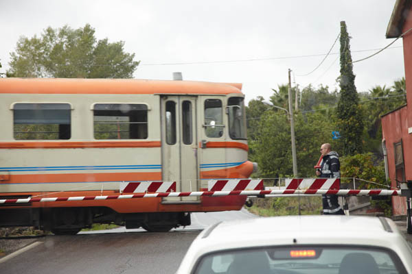 A train crossing on the Etna slopes