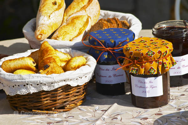 Breakfast with croissants, pain au chocolat, jam and coffee