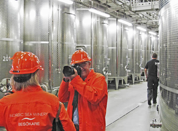 A wine writer taking pictures at the Nordic Sea Winery