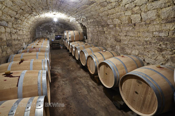 An old wine cellar with new barrels in Cahors