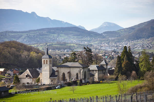 A church in a Savoie village landscape