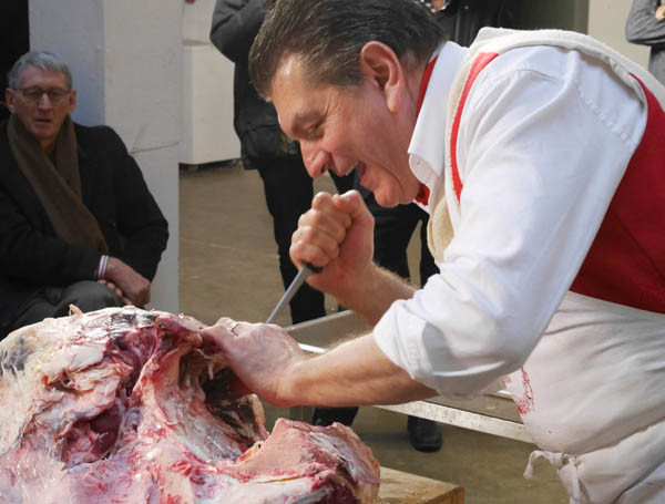 Dario Cecchini butchering a carcass