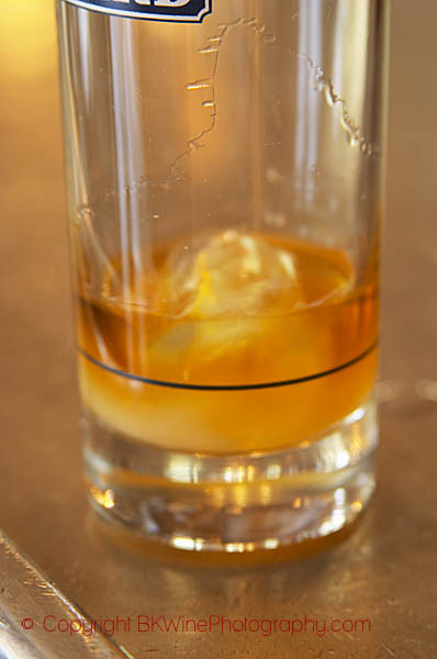 A glass of Ricard pastis on a zinc bar in a cafe in Paris