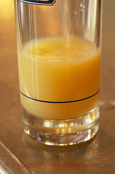 A glass of Ricard pastis on a zinc bar in a cafe in Paris