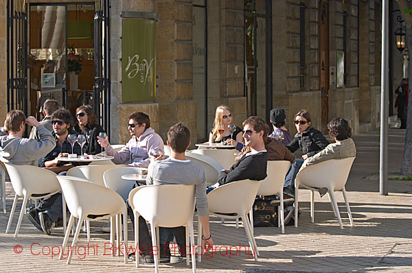 Young people drinking wine in a wine bar