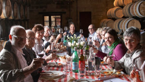 Enjoying lunch with the winemaker in a cellar in Bordeaux