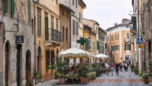 Restaurants in a street in the village of Montalcino, Tuscany