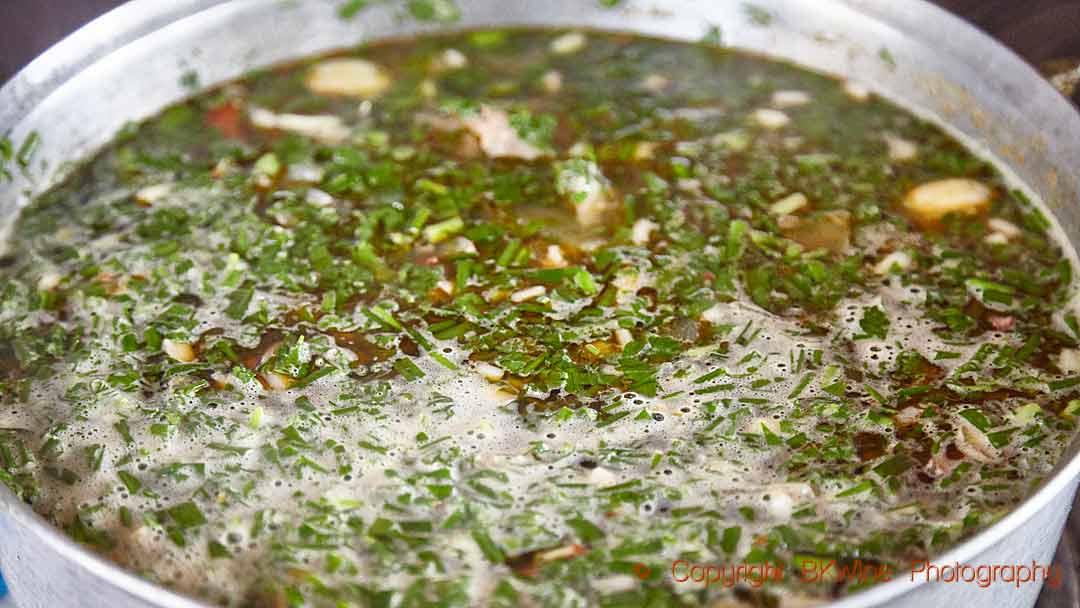 Simmering the suckling lamb soup or stew at Vinuri de Comrat, Moldova