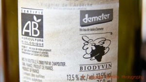 A label with organic branding, Agriculture Biologique, and two biodynamic, Demeter and Biodyvin, Domaine Chapoutier, Rhone Valley