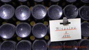 Bottles of riesling 1999 in a cellar in Alsace