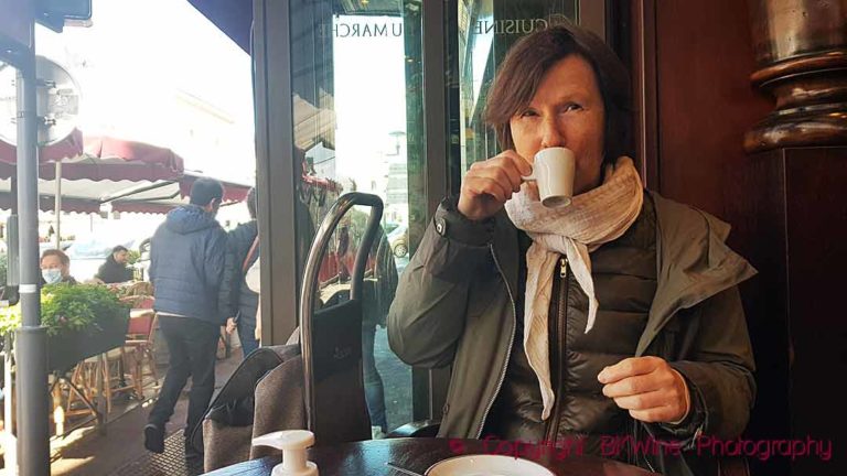 Britt Karlsson enjoying a coffee in a café in Paris on a cold day