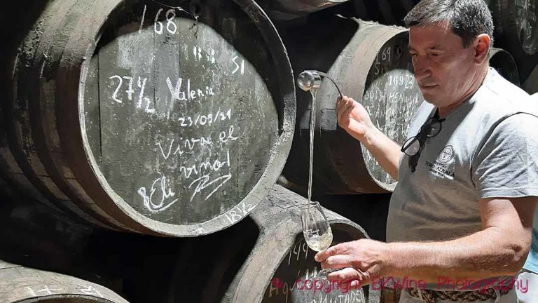 A “venenciador” sampling wine from barrel at Bodegas Toro Albala in Montilla-Moriles