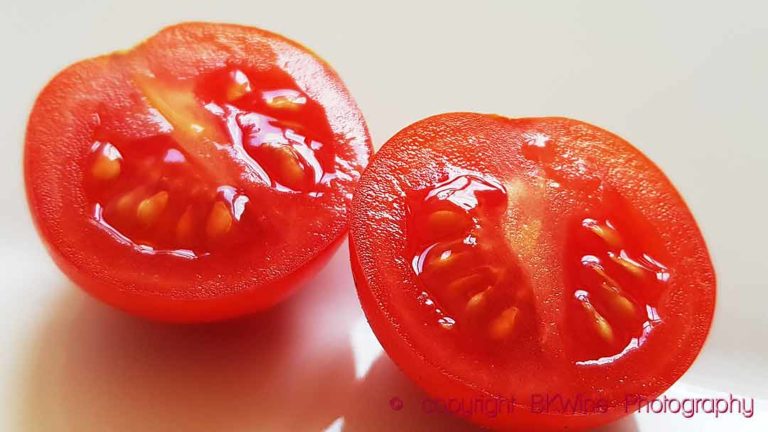 A fresh tomato cut in half