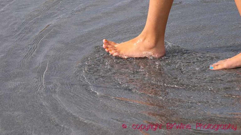 Child's feet in water