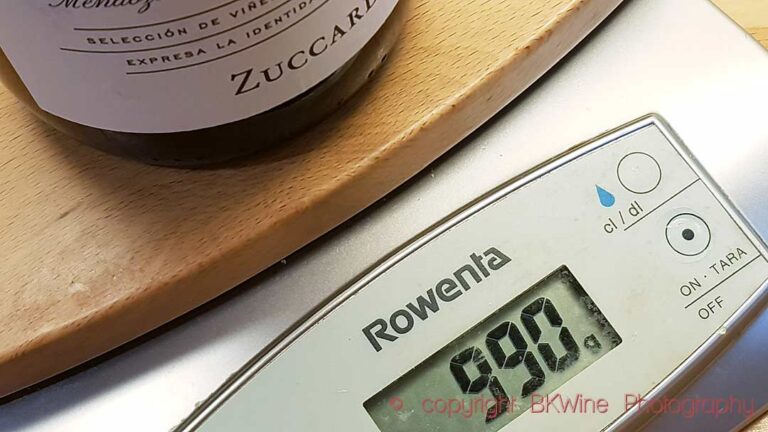 A heavy wine bottle, weighing 990 grams