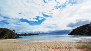 A bay with clouds in New Zealand, on Waiheke Island
