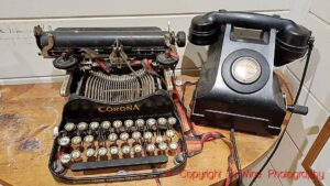 An old Corona typewriter and phone, seen in Arrowtown, New Zealand